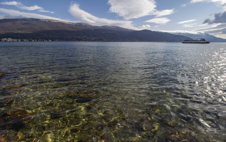 A series of lake landscapes. The clear waters amid beautiful cloudy skies.