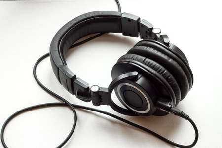 Black headphones isolated on white backgroundの写真素材