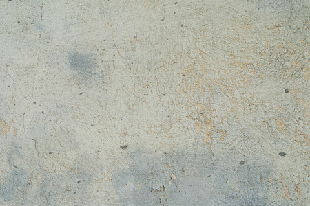 Gray cracks texture on the wallの写真素材