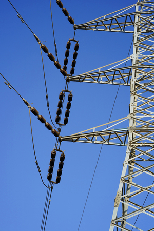High voltage electric poles on blue sky backgroundの写真素材