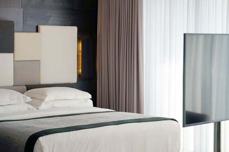 Modern bedroom interior in the hotel.の写真素材