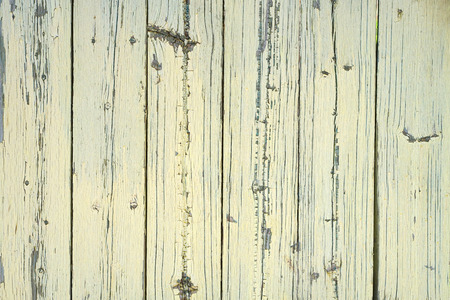 Texture of old yellow scratched wooden a plankの写真素材
