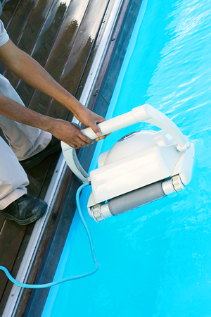 Pool cleaner during his workの写真素材