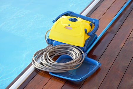 Pool cleaner during his work. Cleaning robot for cleaning the botton of swimming pools.