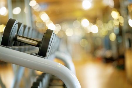 Rows of dumbbells in the gymの写真素材