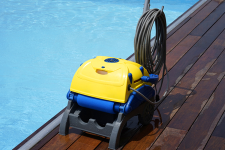 Pool cleaner during his work. Cleaning robot for cleaning the botton of swimming pools.の写真素材