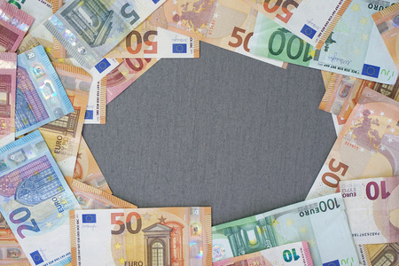 Euro banknotes laid out evenly. Financial background. Different Euro banknotes frame. business,...