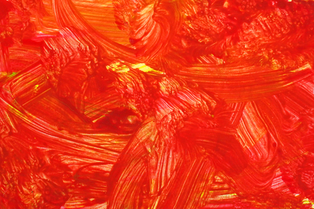 An abstract gouache painting. Red grunge brush strokes gouache paint. Colorful textured background.の写真素材