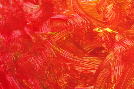An abstract gouache painting. Red grunge brush strokes gouache paint. Colorful textured background.の写真素材