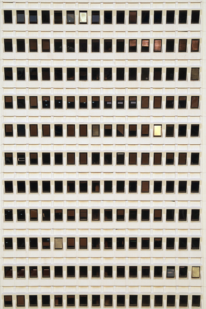 Repeating patterns, architectural details and geometric constructions. Residential buildings. Pattern of windows and room in buildingの写真素材