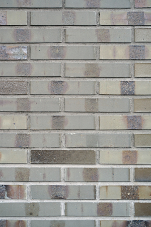 Gray stone wall, background, texture. Old gray brick wall texture backgroundの写真素材