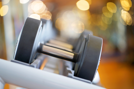 Close-up rows of dumbbells in the gymの写真素材