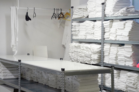 Hotel linen cleaning services. Hotel laundryの写真素材