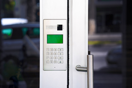 Secure password on keyboard for opening home house door. Password code Security keypad system protected in Public Building. The security code combination to unlock the doorの写真素材