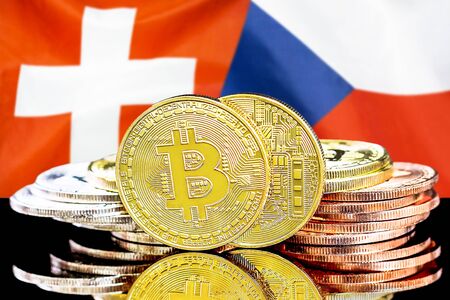 Concept for investors in cryptocurrency and Blockchain technology in the Switzerland and Czech Republic. Bitcoins on the background of the flag Switzerland and Czech Republic.の写真素材