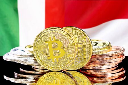 Concept for investors in cryptocurrency and Blockchain technology in the Italy and Monaco. Bitcoins on the background of the flag Italy and Monaco.の写真素材