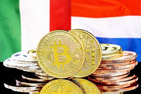 Concept for investors in cryptocurrency and Blockchain technology in the Italy and Netherlands. Bitcoins on the background of the flag Italy and Dutch.の写真素材