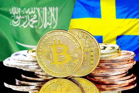 Concept for investors in cryptocurrency and Blockchain technology in the Saudi Arabia and Sweden. Bitcoins on the background of the flag Saudi Arabia and Sweden.の写真素材