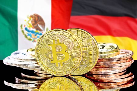 Concept for investors in cryptocurrency and Blockchain technology in the Mexico and Germany. Bitcoins on the background of the flag Mexico and Germany.の写真素材