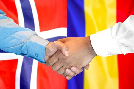 Business handshake on the background of two flags. Men handshake on the background of the Norway and Moldova flag. Support conceptの写真素材