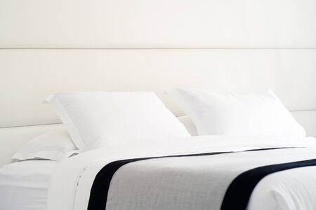 Modern bedroom interior in the hotel. Interior of a hotel bedroomの写真素材
