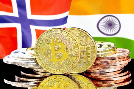 Concept for investors in cryptocurrency and Blockchain technology in the Norway and India. Bitcoins on the background of the flag Norway and India.の写真素材