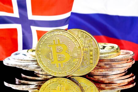 Concept for investors in cryptocurrency and Blockchain technology in the Norway and Russia. Bitcoins on the background of the flag Norway and Russia.の写真素材