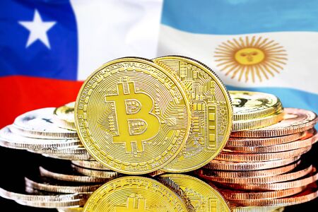 Concept for investors in cryptocurrency and Blockchain technology in the Chile and Argentina. Bitcoins on the background of the flag Chile and Argentina.の写真素材