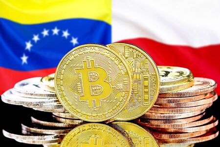 Concept for investors in cryptocurrency and Blockchain technology in the Venezuela and Poland. Bitcoins on the background of the flag Venezuela and Poland.の写真素材