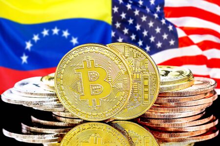 Concept for investors in cryptocurrency and Blockchain technology in the Venezuela and United States of America. Bitcoins on the background of the flag Venezuela and US.の写真素材