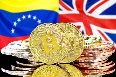 Concept for investors in cryptocurrency and Blockchain technology in the Venezuela and United Kingdom. Bitcoins on the background of the flag Venezuela and UK.の写真素材