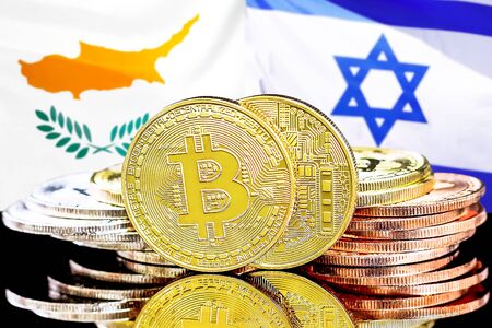 Concept for investors in cryptocurrency and Blockchain technology in the Cyprus and Israel. Bitcoins on the background of the flag Cyprus and Israel.の写真素材