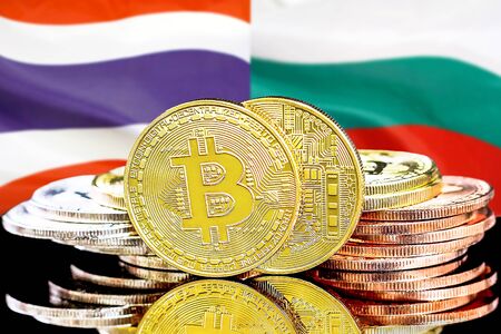 Concept for investors in cryptocurrency and Blockchain technology in the Thailand and Bulgaria. Bitcoins on the background of the flag Thailand and Bulgaria.の写真素材
