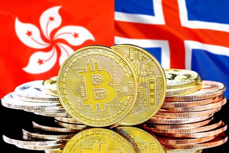 Concept for investors in cryptocurrency and Blockchain technology in the Hong Kong and Iceland. Bitcoins on the background of the flag Hong Kong and Iceland.の写真素材