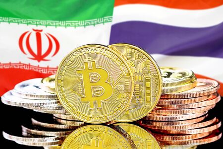 Concept for investors in cryptocurrency and Blockchain technology in the Iran and Thailand. Bitcoins on the background of the flag Iran and Thailand.の写真素材