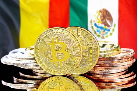 Concept for investors in cryptocurrency and Blockchain technology in the Belgium and Mexico. Bitcoins on the background of the flag Belgium and Mexico.の写真素材