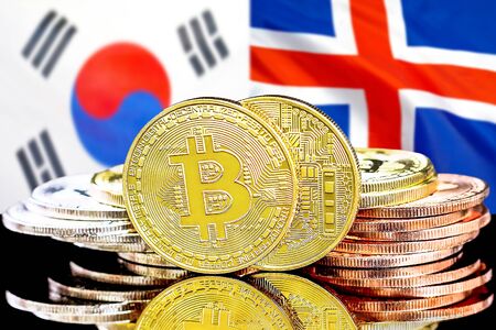 Concept for investors in cryptocurrency and Blockchain technology in the South Korea and Iceland. Bitcoins on the background of the flag South Korea and Iceland.の写真素材
