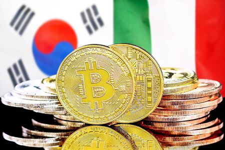 Concept for investors in cryptocurrency and Blockchain technology in the South Korea and Italy. Bitcoins on the background of the flag South Korea and Italy.の写真素材