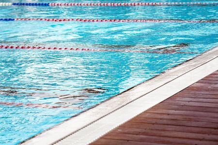Lanes of a competition swimming pool. Empty swimming pool with lanesの写真素材