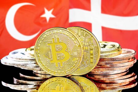 Concept for investors in cryptocurrency and Blockchain technology in the Turkey and Denmark. Bitcoins on the background of the flag Turkey and Denmark.の写真素材