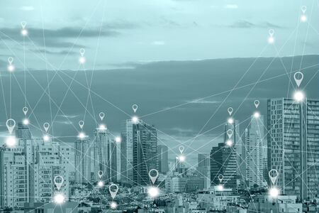 Location gps  or Map pin flat above green tone city scape and network connection concept. Green tone city scape and network connection concept.の写真素材