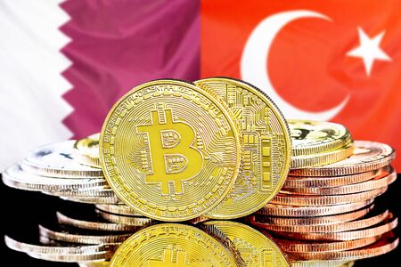 Concept for investors in cryptocurrency and Blockchain technology in the Qatar and Turkey. Bitcoins on the background of the flag Qatar and Turkey.の写真素材