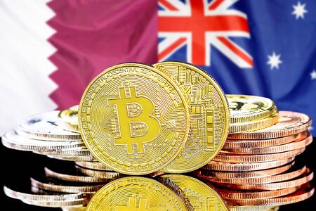 Concept for investors in cryptocurrency and Blockchain technology in the Qatar and Australia. Bitcoins on the background of the flag Qatar and Australia.の写真素材