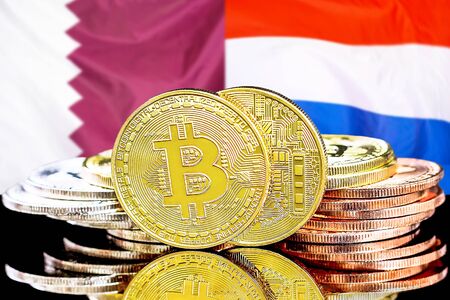 Concept for investors in cryptocurrency and Blockchain technology in the Qatar and Dutch. Bitcoins on the background of the flag Qatar and Netherlands.の写真素材