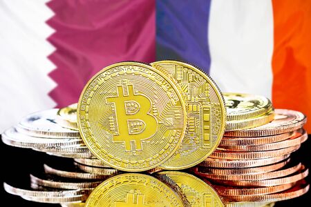 Concept for investors in cryptocurrency and Blockchain technology in the Qatar and France. Bitcoins on the background of the flag Qatar and France.の写真素材
