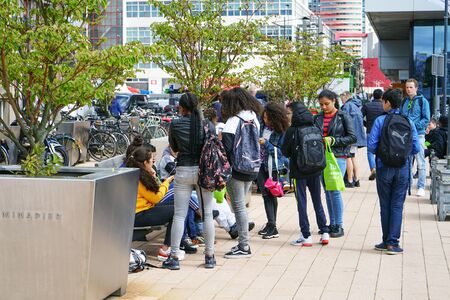 Many teenagers stand on the street of Rotterdam. 7 September 2018. Rotterdam. Netherlands