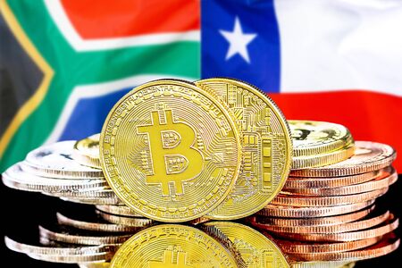 Concept for investors in cryptocurrency and Blockchain technology in the South Africa and Chile. Bitcoins on the background of the flag South Africa and Chile.の写真素材