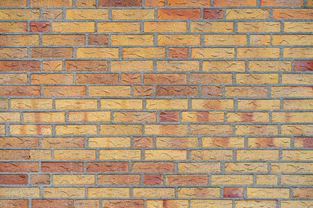 Red Brick wall for background or texture. Old yellow brick wall texture backgroundの写真素材
