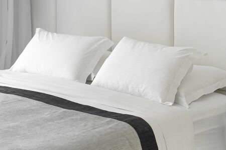 Interior of a hotel bedroom. Modern bedroom interior in the luxury hotel.の写真素材