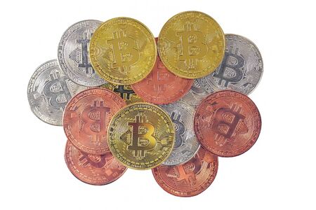 Bitcoin gold, silver, bronze isolated on a white background. Cryptocurrency concept. Bitcoins and New Virtual money. Physical Bitcoin. Cryptocurrency trading concept.の写真素材